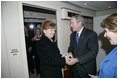 President and Mrs. Bush are greeted aboard Air Force One by Latvian President Vaira Vike-Freiberga after they arrived Friday, May 6, 2005, in Riga. The President and Mrs. Bush are on a four-day visit to Europe that will include stops in Latvia, the Netherlands, Georgia and Russia.