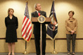 Accompanied by Laura Bush and Secretary of State Condoleezza Rice, President George W. Bush address U.S. Embassy families and staff in Latvia Saturday, May 7, 2005.  Pictured at left are U.S. Ambassador to Latvia, Catherin T. Bailey, and her husband, Irving Bailey II.