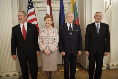 President George W. Bush stands with Latvia's President Vaira Vike-Freiberga, Estonia President Arnold Ruutel and Lithuania President Valdas Adamkus for a photo Saturday, May 7, 2005, in Riga, Latvia.