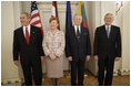 President George W. Bush stands with Latvia's President Vaira Vike-Freiberga, Estonia President Arnold Ruutel and Lithuania President Valdas Adamkus for a photo Saturday, May 7, 2005, in Riga, Latvia.