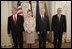 President George W. Bush stands with Latvia's President Vaira Vike-Freiberga, Estonia President Arnold Ruutel and Lithuania President Valdas Adamkus for a photo Saturday, May 7, 2005, in Riga, Latvia.