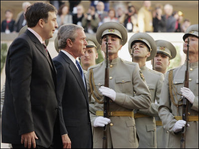 Troops stand at attention as President George W. Bush and Georgian President Mikhail Saakashvili  review the troops during an arrival ceremony  in Tiblisi Tuesday, May 10, 2005.