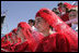 Georgian children in traditional dress join thousands of people gathered in Freedom Square to hear President Bush speak the President's in Tbilisi, Georgia, Tuesday, May 10, 2005. "As you build freedom in this country, you must know that the seeds of liberty you are planting in Georgian soil are flowering across the globe," said President Bush in his remarks." I have come here to thank you for your courage."