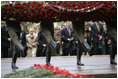 Commemorating the 60th Anniversary of the end of World War II, President George W. Bush and Laura Bush join world leaders in a wreath laying ceremony at the Tomb of the Unknown Soldier at the Kremlin wall Monday, May 9, 2005.