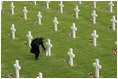 Mrs. Laura Bush lays flowers at the Netherlands American Cemetery Sunday, May 8, 2005, in Margraten.