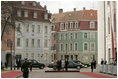 President George W. Bush and Laura Bush participate in a ceremony with Latvia's President Vaira Vike-Freiberga and her husband Imants Freiberga at the Freedom Monument in Riga, May 7, 2005.