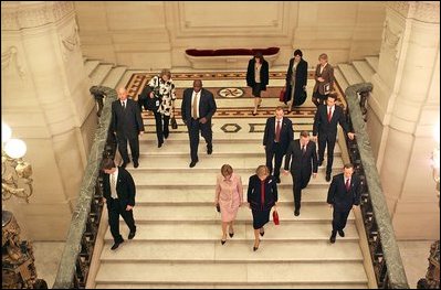 Laura Bush walks with Queen Paola of Belgium during a tour of the Royal Palace of Belgium in Brussels Monday, Feb. 21, 2005.