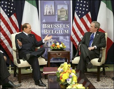 President George W. Bush meets with Italian Prime Minister Silvio Berlusconi Tuesday, Feb. 22, 2005, at NATO Headquarters in Brussels. 