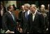 President George W. Bush laughs with Greek Prime Minister Costas Karamanlis, left, during a meeting at the European Union Council building in Brussels Tuesday, Feb. 22, 2005. 