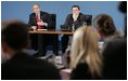 President Bush and German Chancellor Gerhard Schroeder speak Wednesday, Feb. 23, 20025, to a roundtable of young professionals at the Electoral Palace in Mainz, Germany.