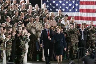 During a Feb. 23, 2005, visit to Wiesbaden Army Air Field in Wiesbaden, Germany, President George W. Bush and Laura Bush are welcomed by applause from U.S. troops.