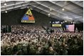 President Bush is nearly lost in a sea of camouflage as he addresses troops Wednesday, Feb. 24, 2005, at Wiesbaden Army Air Field in Wiesbaden, Germany.