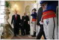 During his visit to the Presidential Palace in Bratislava, President George W. Bush walks with Slovak President Ivan Ivan Gasparovic Thursday, February 24, 2005.