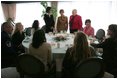 Mrs. Bush talks with spouses of deployed military during a luncheon Tuesday, Feb. 22, 2005, at Ramstein Air Base in Ramstein, Germany.