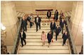 Laura Bush walks with Queen Paola of Belgium during a tour of the Royal Palace of Belgium in Brussels Monday, Feb. 21, 2005.