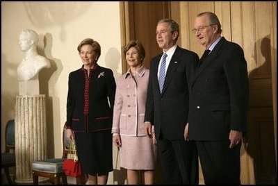 President George W. Bush and first lady Laura Bush are welcomed by King Albert II and Queen Paolo of Belgium at the palace office in Brussels, Monday, Feb. 21, 2005.