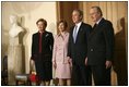 President George W. Bush and first lady Laura Bush are welcomed by King Albert II and Queen Paolo of Belgium at the palace office in Brussels, Monday, Feb. 21, 2005.