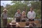 As his brother, Florida Governor Jeb Bush stands by his side, President George W. Bush speaks at the Royal Palm Visitors Center at Everglades National Park, Fla., June 4, 2001. White House photo by Eric Draper.