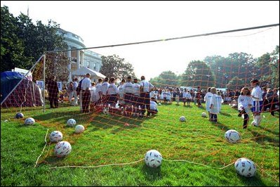 As some tried their luck punting with the Washington Redskins, others took some kicks from gold medalist Mia Hamm at the soccer exhibit. With more than a dozen exhibits on hand, fitness fair visitors could try their skill at rock climbing, basketball, pitching, batting and a host of other activities.