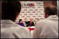 President George W. Bush talks with local police, fire, health and government officials during a roundtable meeting at the Center for Community Safety at Winston-Salem State University, Wednesday, Jan 30, 2002. 