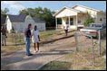 After helping build a house for Habitat for Humanity, President Bush meets some of his Waco neighbors. 