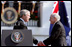 After delivering his remarks, President George W. Bush shakes hands with Australian Prime Minister John Howard during the State Arrival Ceremony held for the Prime Minister on the South Lawn Tuesday, May 16, 2006. White House photo by Paul Morse