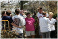 Vice President Dick Cheney and Mrs. Cheney talk with residents of one Gulfport, Mississippi hurricane damaged neighborhood, during a walking tour to view damages and relief efforts Thursday, September 8, 2005.  Hurricane Katrina struck Mississippi and Louisiana August 31.