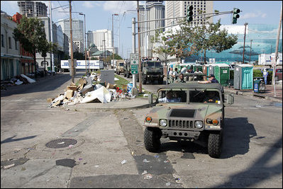 Vice President Dick Cheney surveys the damage caused by Hurricane Katrina in New Orleans, Louisiana Thursday, September 8, 2005. The Vice President's tour of the city includes visits with police and EMS personnel working in the area.