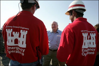 Vice President Dick Cheney speaks with members of the US Army Corps of Engineers personnel while taking a tour of the 17th Street levee repair operations in New Orleans, Louisiana Thursday, September 8, 2005.