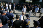 Mrs. Cheney shakes hands with members of the U.S. Army Corps of Engineers repair personnel and U.S. Coast Guard personnel at the 17th Street levee in New Orleans, Louisiana Thursday, September 8, 2005.  The Vice President and Mrs. Cheney spent the day touring the flood ravaged areas of Mississippi and Louisiana to survey the damage and relief efforts in the wake of Hurricane Katrina.