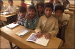 Children return to school in a village near the city of Najaf in central Iraq on April 4, 2003, for the first time since the war started.