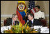 President George W. Bush and President Alvaro Uribe of Colombia participate in an Afro-Colombian Outreach program during President Bush’s visit Sunday, March 11, 2007. White House photo by Eric Draper