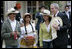 President George W. Bush poses for photos with Colombian coffee growers in the mall of the Presidential Palace in Bogota during his visit Sunday, March 11, 2007. White House photo by Eric Draper