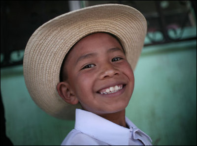 A young student from the Carlos Emilio Leonardo School in Santa Cruz Balanya, Guatemala, smiles as he awaits the arrival Monday, March 12, 2007, of President George W. Bush and Laura Bush. The visit to the Central America country marked the fourth stop on the trip of the President and Mrs. Bush to five Latin American countries. White House photo by Paul Morse