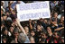 Scores of villagers greet President and Mrs. Bush Monday, March 12, 2007, as they visit Santa Cruz Balanya, Guatemala, and a town of nearly 10,000 mostly indigenous people. White House photo by Paul Morse