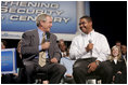 President George W. Bush talks with Yuctan Hodge, 24, during a conversation on Social Security at the James Lee Community Center, Falls Church, Va., Friday, April 29, 2005.