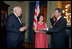 Vice President Dick Cheney swears in NASA Administrator Michael Griffin as his wife, Rebecca Griffin, holds the Bible during a ceremony in the Vice President's Ceremonial Office at the Dwight D. Eisenhower Executive Office Building Tuesday, June 28, 2005. Mr. Griffin is the 11th Administrator of the National Aeronautics and Space Administration.