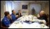 Vice President Dick Cheney meets with astronauts Dan Bursch, left, Carl Walz, center, Frank Culbertson and NASA Administrator Sean O'Keefe, who is not pictured, at NASA Headquarters in Washington, D.C., Wednesday, Nov. 20. Mr. Bursch and Mr. Walz hold the U.S. space endurance record for spending 196 days in space.