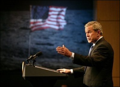 President George W. Bush delivers remarks on U.S. Space Policy at NASA headquarters in Washington, D.C., Wednesday, Jan. 14, 2004. The President committed the United States to a long-term human and robotic program to explore the solar system, starting with a return to the Moon that will ultimately enable future exploration of Mars and other destinations.