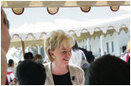 Lynne Cheney watches fourth graders from local Fairfax County public schools try to write with a quill pen during during a Constitution Day 2005 celebration at George Washington's Mount Vernon Estate Friday, September 16, 2005. Lynne Cheney hosted the celebration which marks the 218th anniversary of the signing of the U.S. Constitution. 