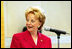 Lynne Cheney reacts as historical actors playing the roles of the founding fathers enter the stage during a Constitution Day celebration hosted by Mrs. Cheney at the National Constitution Center in Philadelphia Wednesday, Sept. 17, 2003.