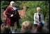 Lynne Cheney looks on as Benjamin Franklin address a group of fourth graders from local Fairfax County public schools during a Constitution Day 2005 celebration at George Washington's Mount Vernon Estate Friday, September 16, 2005. Mrs. Cheney hosted the event which celebrates the anniversary of the signing of the U.S. Constitution 218 years ago. 