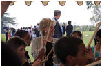 Lynne Cheney participates in a drumming activity with a group of fourth graders from local Fairfax County public schools during a Constitution Day 2005 celebration at George Washington's Mount Vernon Estate Friday, September 16, 2005. The event celebrates the anniversary of the signing of the U.S. Constitution 218 years ago. 