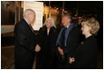 Nobel Peace Prize winner Elie Wiesel and his wife Marion Wiesel talk with Vice President Dick Cheney and his wife Lynne Cheney during a reception for holocaust survivors at the Galicia Jewish Museum in Krakow, Poland, Jan. 26, 2005. The Wiesel's, holocaust survivors themselves, were part of a United States delegation to Poland, led by Vice President Cheney to take part in ceremonies commemorating the 60th Anniversary of the liberation of the Auschwitz camps. White House photo by David Bohrer 