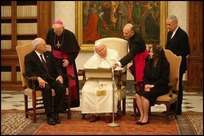 Vice President Dick Cheney and his wife, Lynne, meet His Holiness Pope John Paul II in the Vatican in Rome Jan. 27, 2004. The visit was part of a five-day trip through Switzerland and Italy for consultations with European allies on national security and economic matters