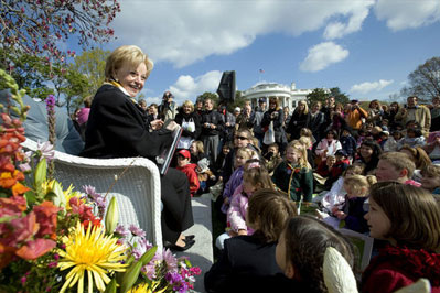 Lynne Cheney reads from her book, "America: A Patriotic Primer," at the White House Easter Egg Roll Monday, April 21, 2003. Accompanying Mrs. Cheney, several Cabinet members and authors also read to children during the day.