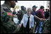 Mrs. Cheney shakes hands with police and military EMS personnel during a recent tour to the flood ravaged areas of New Orleans, Louisiana Thursday, September 8, 2005, to survey damage and relief efforts in the wake of Hurricane Katrina.