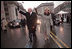 Vice President Dick Cheney and his wife, Lynne, wave to the crowds of people lining Pennsylvania Avenue as they participate in the Presidential Inaugural Parade January 20, 2001.