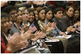 Arlene Oftedahl of Burke, Va., center, is all smiles as she and some of America’s newest citizens applaud Mrs. Cheney as she delivers her remarks during a special naturalization ceremony at the National Archives Tuesday, April 17, 2007, in Washington, D.C. White House photo by Lynden Steele