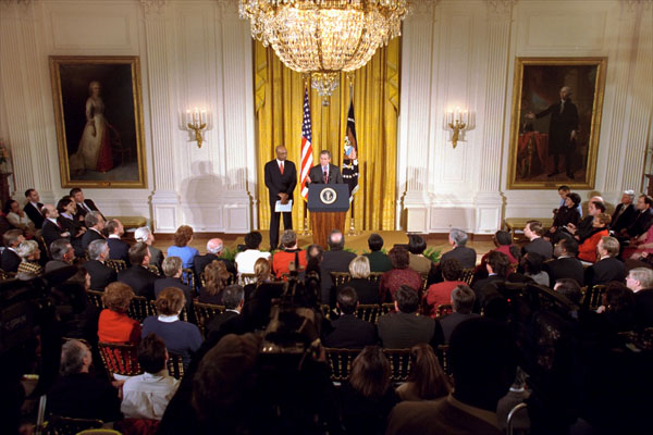 President George W. Bush and Rod Paige, who has been chosen to be the Secretary of Education, unveil the administration's education plan in the East Room Jan. 23, 2001. "Both parties have been talking about education reform for quite a while," said the President. "It's time to come together to get it done so that we can truthfully say in America, 'No child will be left behind -- not one single child.' We share a moment of exceptional promise -- a new administration, a newly sworn-in Congress, and we have a chance to think anew and act anew." White House photo by Hyungwon Kang